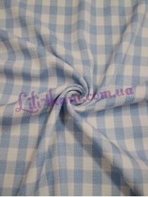 Костюмна в клітинку